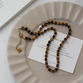 Aribelle Faceted Tiger Eye Necklace [TAF4Q0DV]